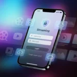 User attempting movie box pro login on a smartphone and laptop, showing a simple login screen with email and password fields in a realistic home workspace setup.